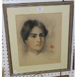 19th Century Continental School - Portrait of a Young Woman, charcoal and coloured chalk, dated '92,