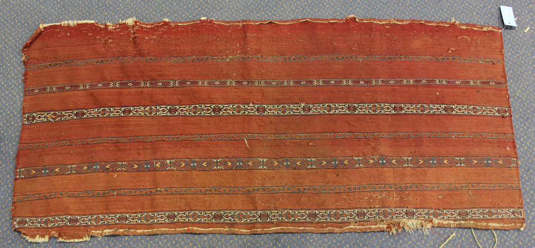 A Tekke kizil juval, West Turkestan, 19th Century, the terracotta flatweave panel with horizontal - Image 2 of 2