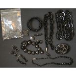 A group of Victorian and later black mourning jewellery, including some jet, mostly bead
