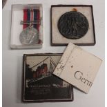 An R.M.S. Lusitania commemorative medal with box (box scuffed and torn, lid detached), a 1939-45 War