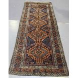 A Beluche runner, Afghan/Persian borders, early 20th Century, the midnight blue field with five