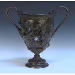 A 19th Century Continental green patinated classical style bronze krater, the main body decorated in