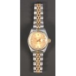 A Rolex Oyster Perpetual Datejust steel, gold and diamond set lady's bracelet wristwatch, the signed