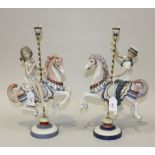 Two Lladro porcelain figures of a girl and boy on a carousel horse, Nos. 1469 and 1470, boxed (one