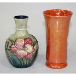 A Moorcroft pottery Freesia pattern vase, circa 1940, the baluster body decorated with flowers