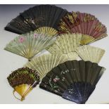 A group of various fans, including a 19th Century pierced bone brisé fan and two late 18th Century