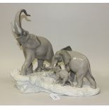 A Lladro porcelain figure group Elephants Walking, No. 1150 (restoration).