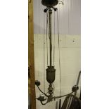 A Victorian brass rise and fall ceiling gas lamp, height approx 104cm (converted to electricity).