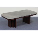 A modern Art Deco style coffee table with a composition top above angular legs, height approx