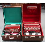 A modern piano accordion by Baile and another similar piano accordion, both cased.