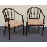 A pair of Edwardian mahogany tub back armchairs with inlaid decoration, the triple splat backs above