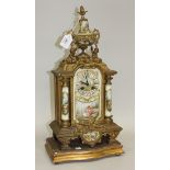 A late 19th Century French gilt spelter and porcelain mantel clock with eight day movement