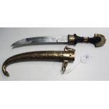 A Middle Eastern brass and white metal mounted jambia with curved blade, length approx 22.5cm,