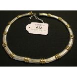 A Tiffany & Co silver and gilt collar necklace in a curved bar shaped link design, with triple