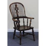 A 19th Century beech and elm Windsor armchair, with a stick and pierced splat back, the moulded seat