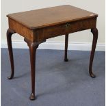 An 18th Century and later walnut lowboy fitted with a single drawer, on cabriole legs, height approx