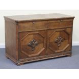 An early 20th Century French oak buffet, fitted with two marble slides above two drawers and a