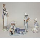 Four Lladro porcelain figures, comprising Girl with Lamb, No. 4505, All Aboard, No. 7619, Girl