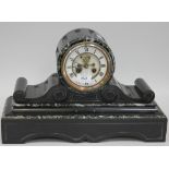 A late 19th Century slate and green marble mantel clock with eight day movement striking on a