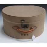 A mid-20th Century cream canvas hat box with leather handle, width approx 47cm.