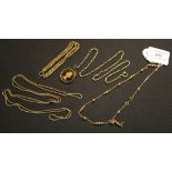 A 9ct gold necklace with beaded divisions at intervals, a pendant with a neckchain, another