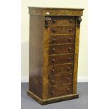 A 20th Century Victorian style burr walnut secrétaire Wellington chest of seven drawers, the moulded