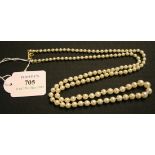 A single row necklace of graduated cultured pearls, on a cylindrical clasp, length approx 83cm.