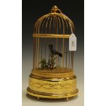 A late 20th Century Swiss 'Reuge Music' musical birdcage with automaton bird, height approx 28.5cm.