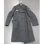 An R.A.F. airman's uniform, the trousers dated 1950, with a greatcoat, dated 1950, two naval