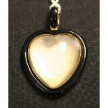 A gold, black enamel and crystal heart shaped pendant locket, the domed crystal front within a black