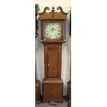 A George III oak longcase clock with thirty hour movement striking on a bell, the square painted