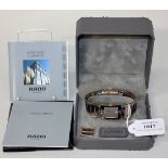 A Rado Diastar gilt and titanium finish gentleman's bracelet watch, the signed rectangular