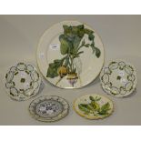 A Cantagalli maiolica plate, late 19th Century, painted with three root vegetables within a yellow