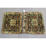 A Khamseh double bag, South-west Persia, early 20th Century, each midnight blue field with a