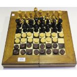 An early 20th Century boxwood and ebonized Staunton chess set, height of king 8cm, together with a