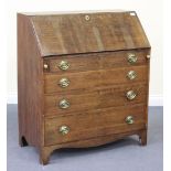 An 18th Century oak bureau, the fall front revealing a fitted interior above four long drawers, on