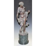 A modern reproduction cast bronze figure of a classical female nude, raised on a green hardstone