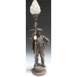 A 19th Century patinated spelter table lamp, modelled as a standing knight in 17th Century