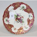 A Worcester porcelain dessert plate, circa 1775, probably later decorated, in the manner of the Hope