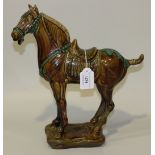 A Beswick pottery figure of a Tsang horse, model No. 2205, height approx 33.5cm (tail repaired).