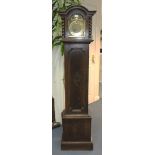 A George V oak diminutive longcase clock with eight day movement chiming on gongs, the brass break