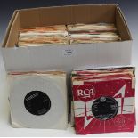 A collection of 7" records, including singles by Gene Vincent, Big Bopper, Buddy Holly, Bo Diddley