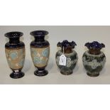 A pair of Royal Doulton stoneware vases, each ovoid body applied with a band of pale blue and