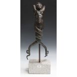 A 19th Century brown patinated cast bronze fountain fitting in the form of a mermaid with spiralling