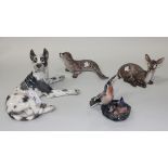 A group of four Jens Dahl-Jensen Copenhagen porcelain models, comprising a recumbent Great Dane, No.