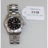 A Tag Heuer Professional 200 Meters steel gentleman's bracelet wristwatch, the signed black dial