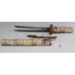 A Japanese carved bone tanto dagger with narrow single edged blade, length approx 18cm, grip