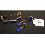 A gold mounted lapis lazuli set bracelet in a rectangular panel shaped link design, on a snap