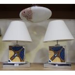 A pair of 20th Century chromium plated and inset ceramic table lamps of rectangular form, together