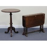 A Victorian mahogany circular wine table, the moulded top on a turned and baluster column with